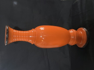 Orange ceramic floor vase